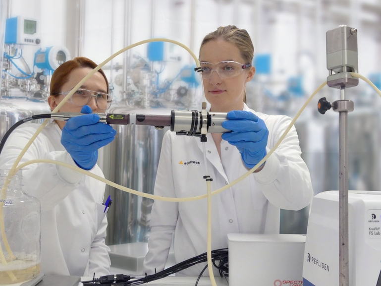 Alvotech case study using Raman systems from Endress+Hauser Alvotech scientists with Raman flow assembly